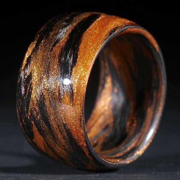 Fingerring Karbon / Mira Cosmic Bronce gewickelt