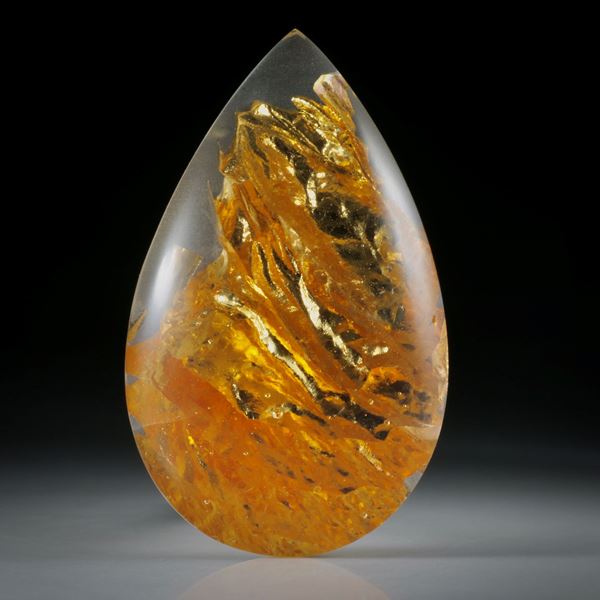 Goldglas (Blattgold 23.75ct. in Glas eingeschmolzen), bombierte Tropfenform poliert, ca.48x29x9mm