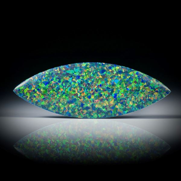 Navette aus synthetischem Opal, beidseitig bombiert und poliert ca.60x21x8mm