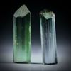 Turmalinkristall Paar, bicolor, total 21.27ct. mit angeschliffenen Standflächen, ca.26x8x5mm und ca.25x7x6mm