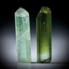 Turmalinkristall Paar grün, total 14.9ct. mit angeschliffenen Standflächen, je ca.24x6.5x5mm und ca.23x6x6mm