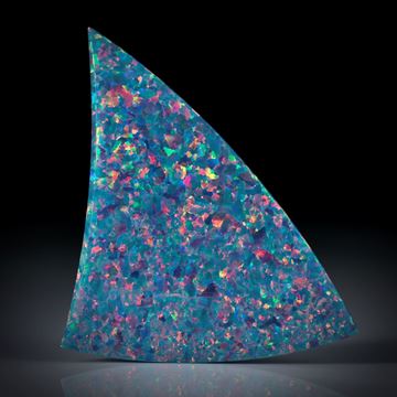 synthetischer Opal, Dreieckform in Torsion geschliffen und beidseitig poliert, ca.55x35x3mm